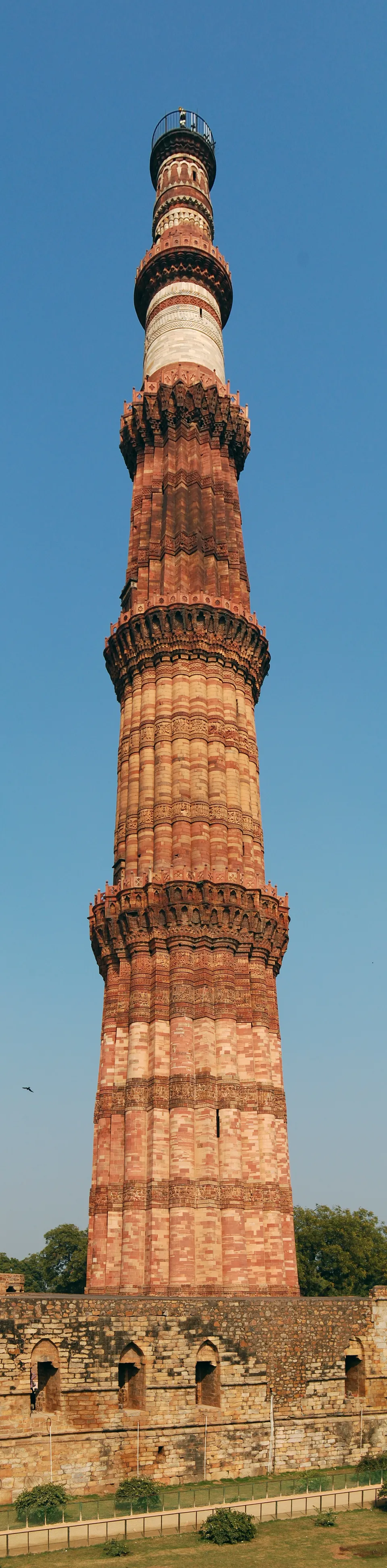 The Qutb Minar in Delhi, a tower about 73 m high begun by Aibak and raised by Iltutmish