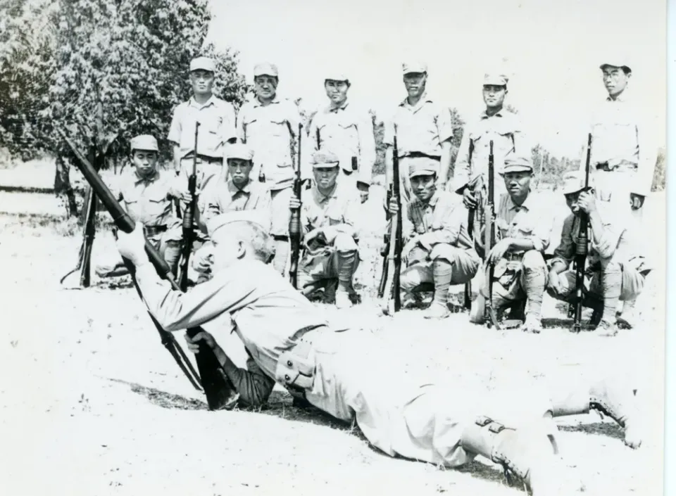Eagle Project — Korean Liberation Army troops training with an OSS instructor, 1945