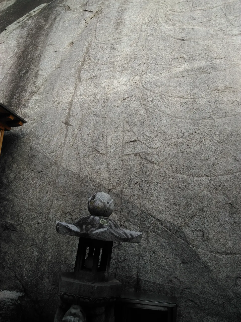 Rock-carved standing Buddha at Icheon-dong, Andong (Jebiwon Buddha) — body carved on the rock, head set on top