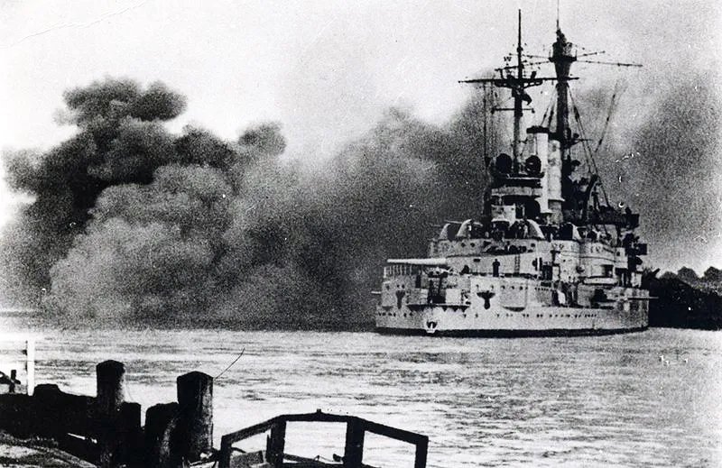 The German battleship Schleswig-Holstein shelling the Polish garrison at Westerplatte, Danzig, 1 September 1939