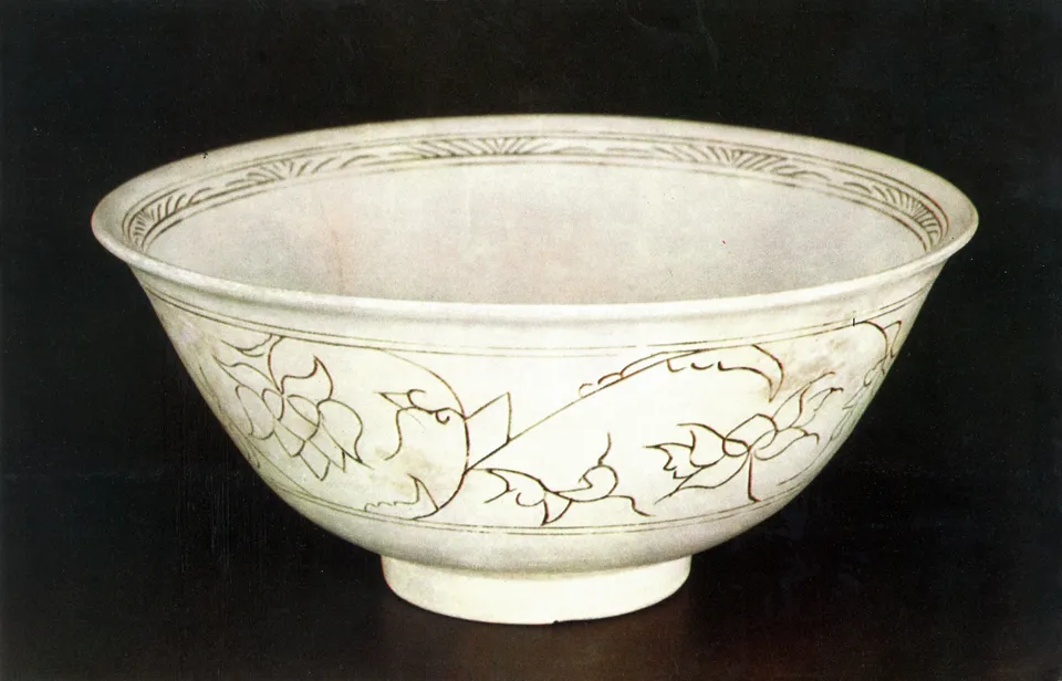 White porcelain bowl with inlaid lotus scroll design — 15th century, National Museum of Korea