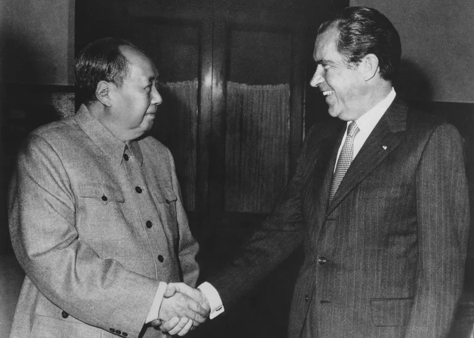 Nixon and Mao Zedong shake hands, Beijing, 21 February 1972