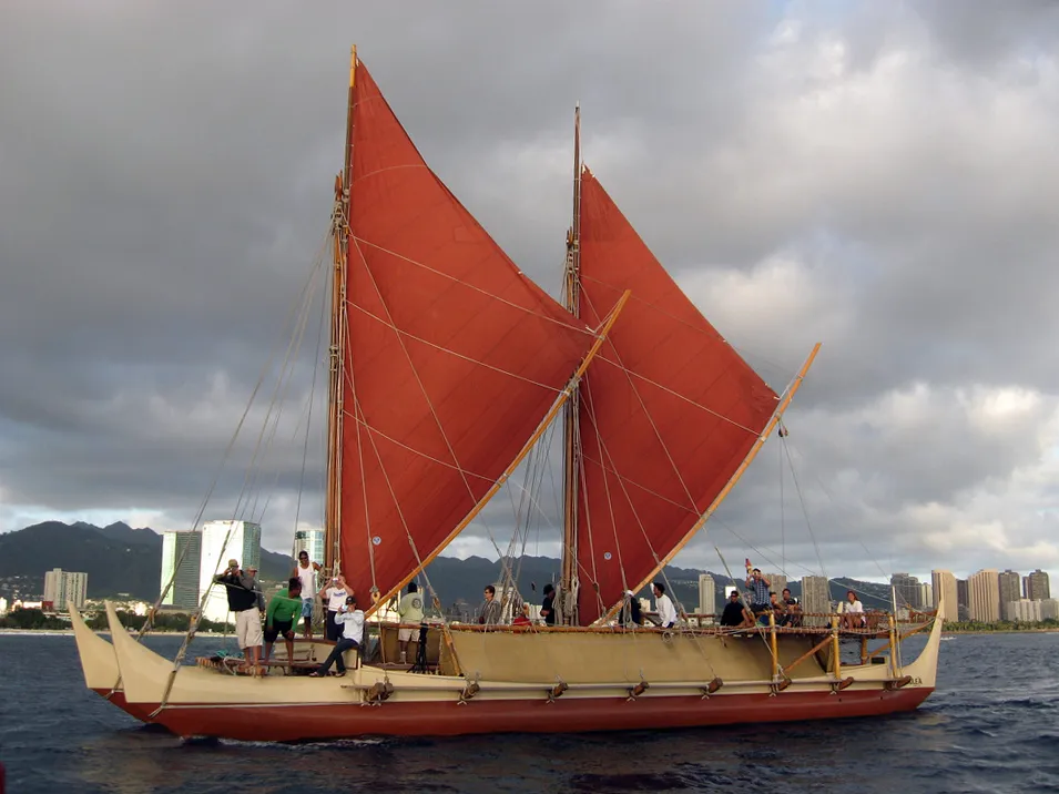The voyaging canoe Hōkūleʻa, a 1975 revival of the ancient Polynesian double-hulled canoe, under sail off Honolulu, 2009