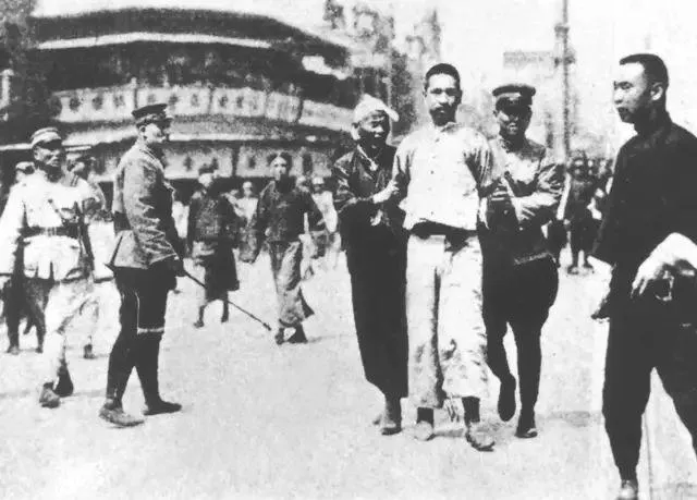 Soldiers and police leading away Communists in Shanghai during the April 12 Incident, 1927