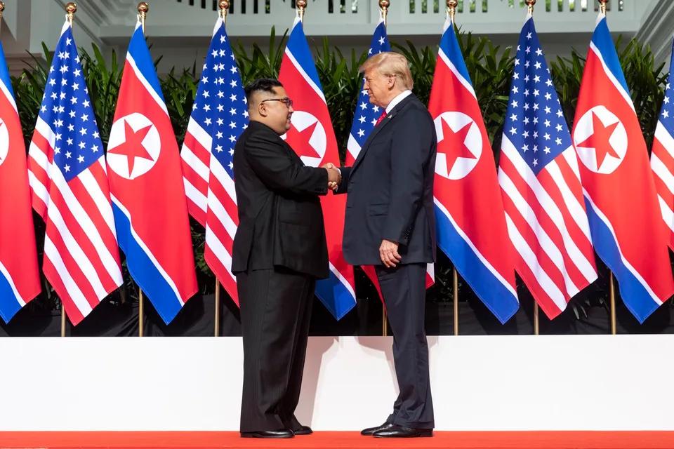 Kim Jong Un and Donald Trump shaking hands at the Capella Hotel, Singapore, 12 June 2018