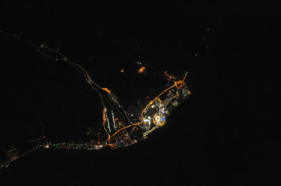 Sochi Olympic Park seen from the International Space Station, with Fisht Stadium and the flame, February 2014