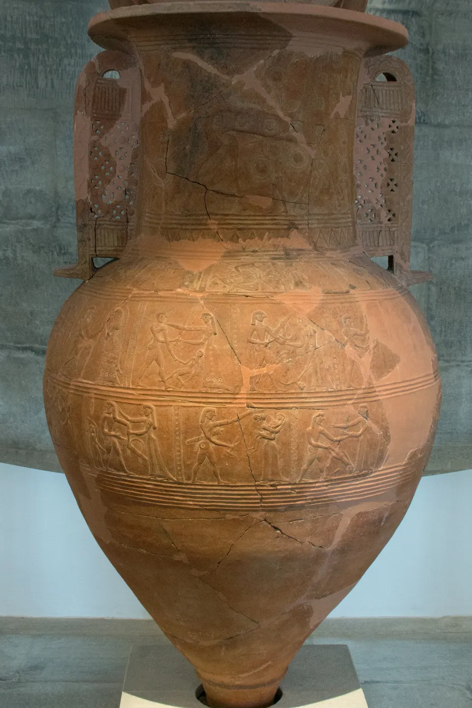 The Mykonos vase — the oldest known depiction of the Trojan Horse, on wheels, with soldiers peering from its hatches; c. 670 BC, Archaeological Museum of Mykonos
